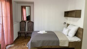 Desk, free WiFi, bed sheets