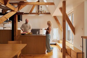 Family Apartment | Private kitchen | Fridge, highchair, cookware/dishes/utensils, spices
