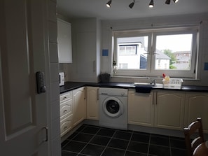 Basic Apartment | Private kitchen | Full-size fridge, microwave, oven, stovetop