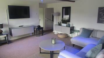 Appartement luxueux | Aire de séjour | Téléviseur à écran plat