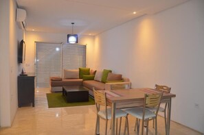 Apartemen, 1 kamar tidur | Area keluarga | TV layar datar