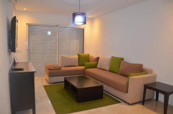 Appartement, 1 slaapkamer | Woonruimte | Flatscreentelevisie