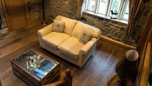 Suite | Sala de estar | Una televisión de pantalla plana