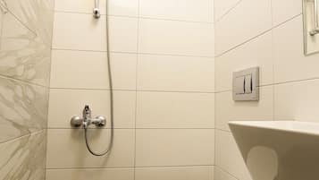 Shower, free toiletries, hair dryer, slippers
