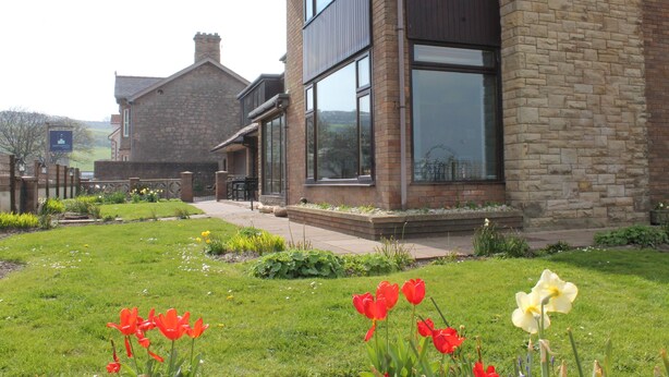 A modern building with a brick facade and large windows. - Eastwatch Guesthouse (Berwick-upon-Tweed)