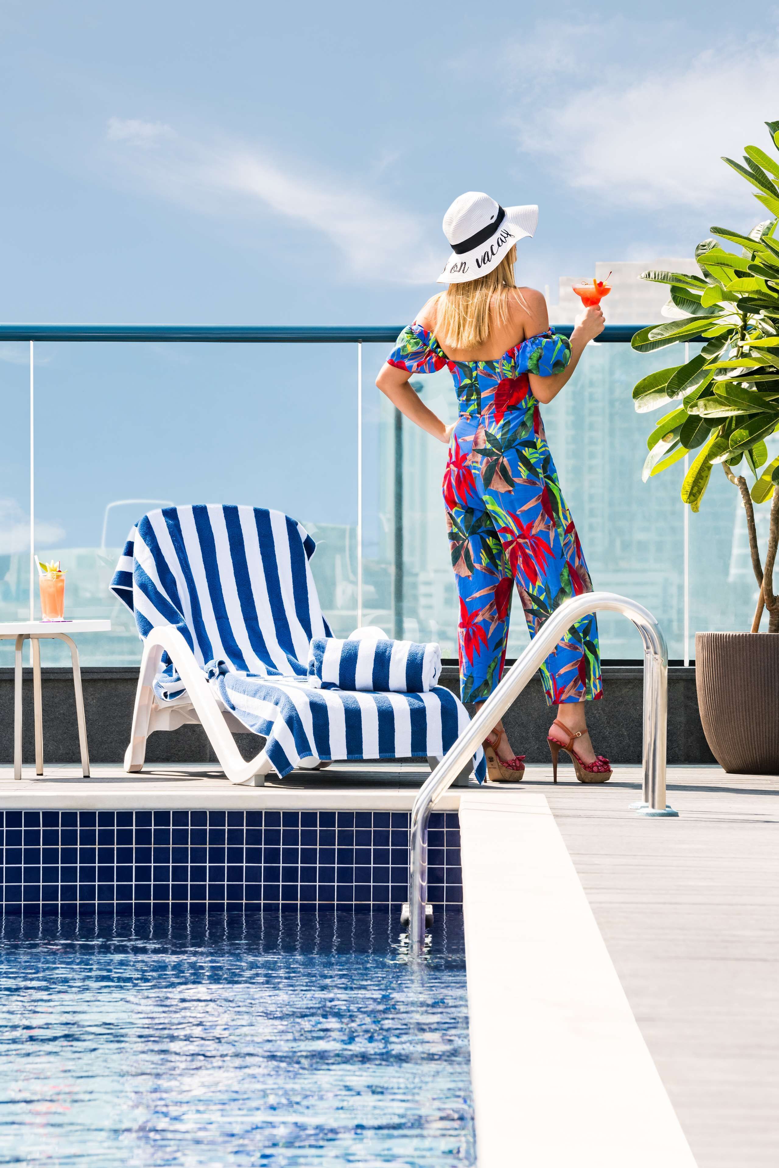 Outdoor pool, open 7:00 AM to 9:00 PM, pool umbrellas, sun loungers