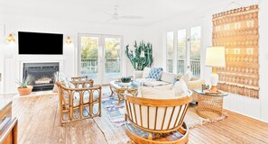 Smart TV, fireplace, books, music library