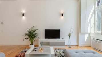 Superior Apartment, 2 Bedrooms | Living area | 32-inch flat-screen TV with cable channels, TV