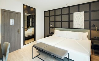 Down comforters, minibar, in-room safe, individually decorated