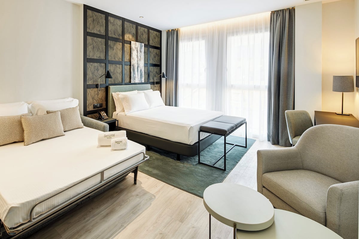 Superior Room | 1 bedroom, down comforters, minibar, in-room safe