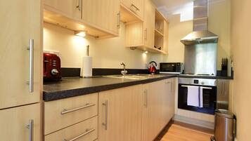 Apartment | Private kitchen | Fridge, microwave, oven, stovetop