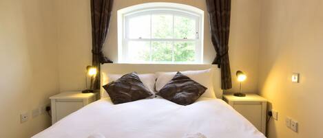 Apartamento | Tabla de planchar con plancha, wifi gratis, ropa de cama