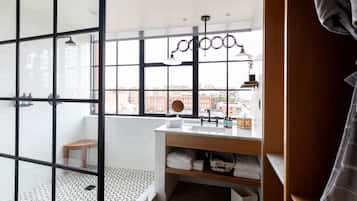 Shower, rainfall showerhead, designer toiletries, hair dryer