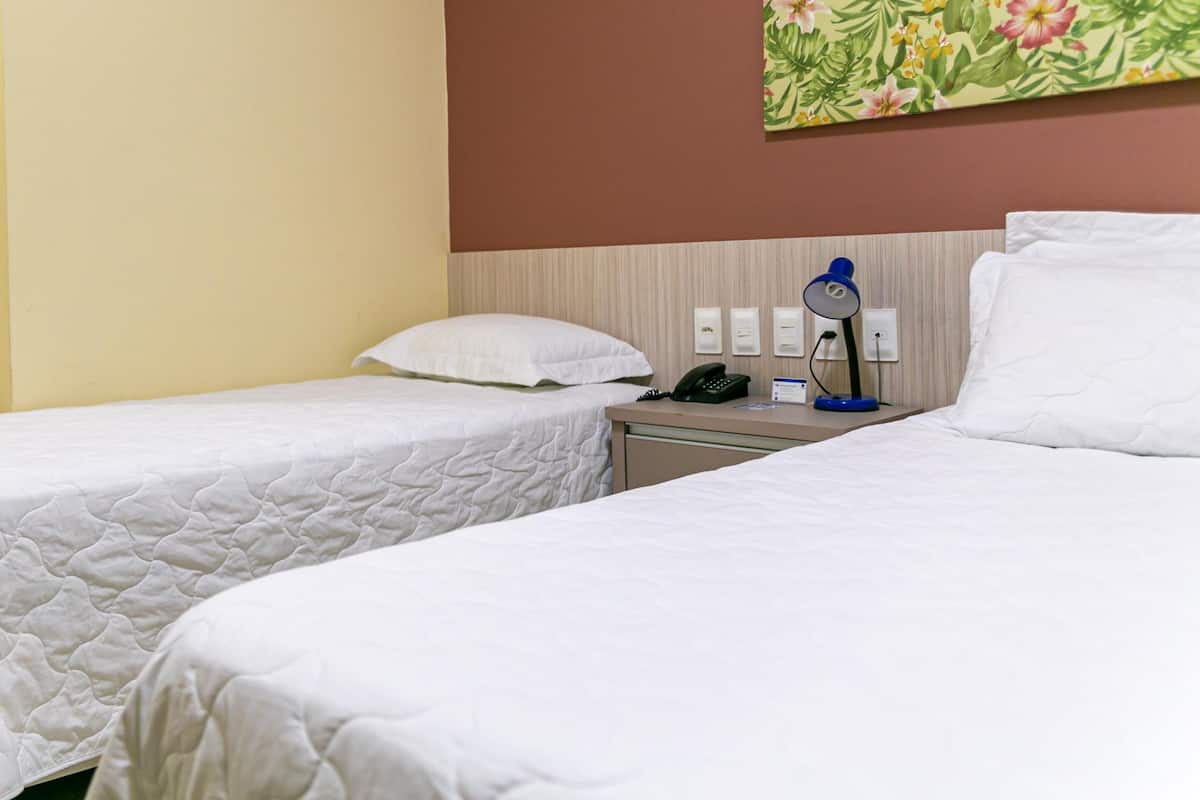 Triple Room | 1 bedroom, blackout drapes, free WiFi, bed sheets