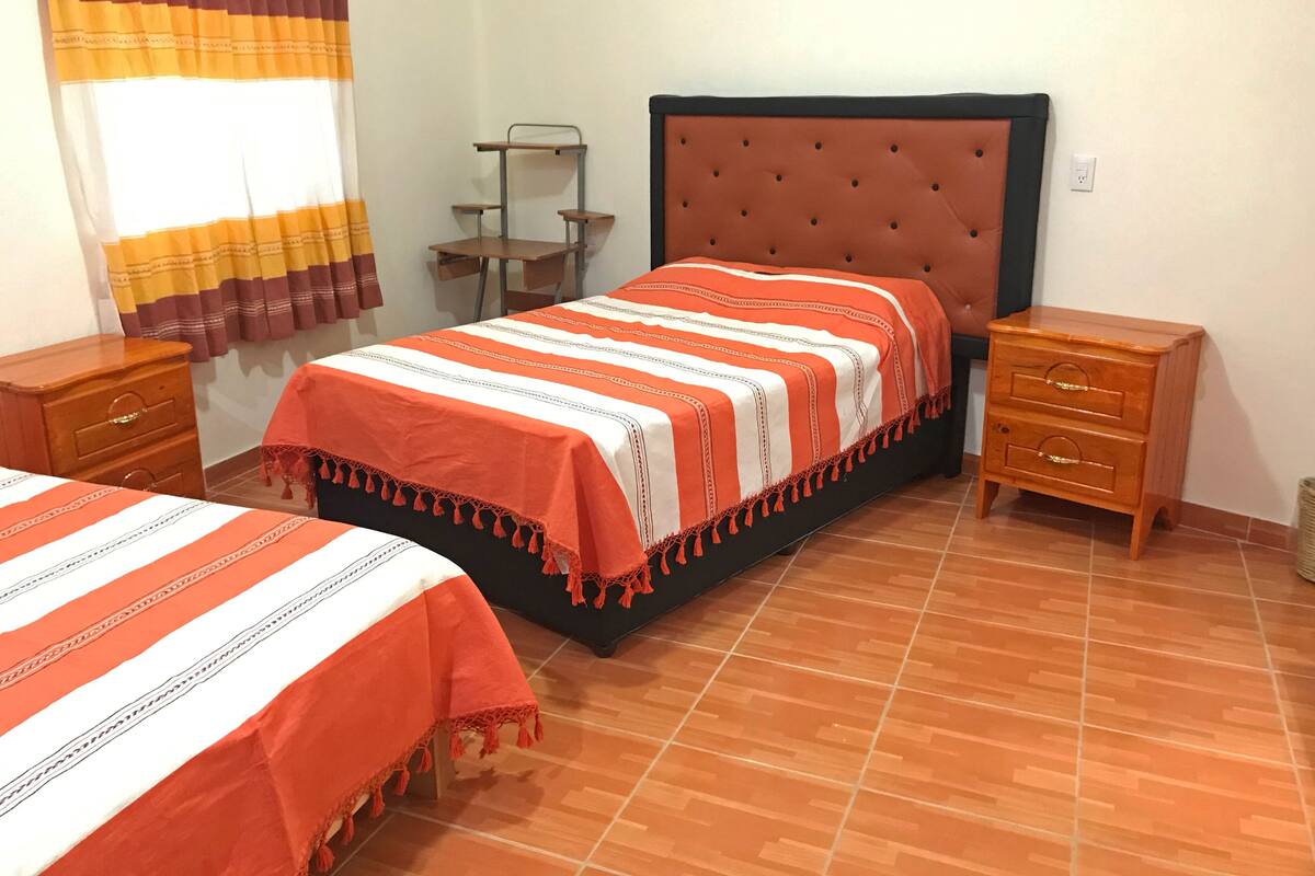 Family Quadruple Room | Down duvets, laptop workspace, blackout curtains, cots/infant beds