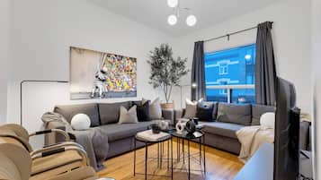Premium Triple Room, 3 Bedrooms, Pets Allowed, City View (Avenue Central Suite 1275) | Living area | 60-inch Smart TV with digital channels, Netflix, streaming services