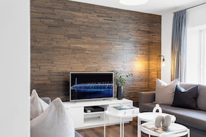 Superior Apartment, 2 Bedrooms, Patio, City View (Soho 1) | Living area | 49-inch Smart TV with digital channels, TV, offices