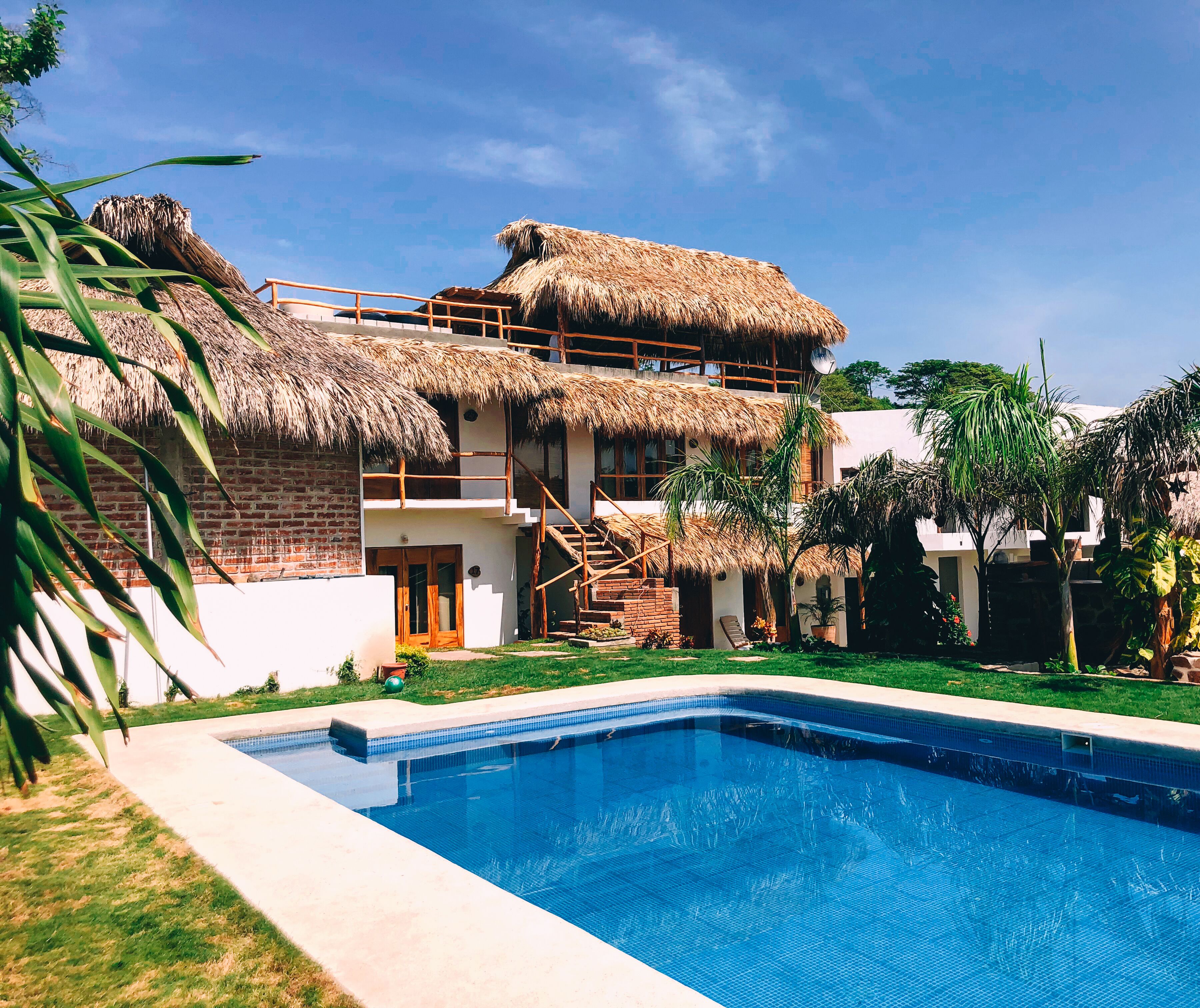 Outdoor pool, open 8:00 AM to 10:00 PM, pool umbrellas, sun loungers