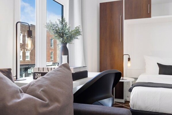 Deluxe Studio, 1 Queen Bed with Sofa bed, Patio, City View (Mont-Royal 201) | Living area | 49-inch flat-screen TV with digital channels, Smart TV, offices - Liv MTL - MTL (Montreal)
