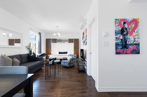Deluxe Studio, 1 Queen Bed with Sofa bed, Patio, City View (Mont-Royal 301) | Living area