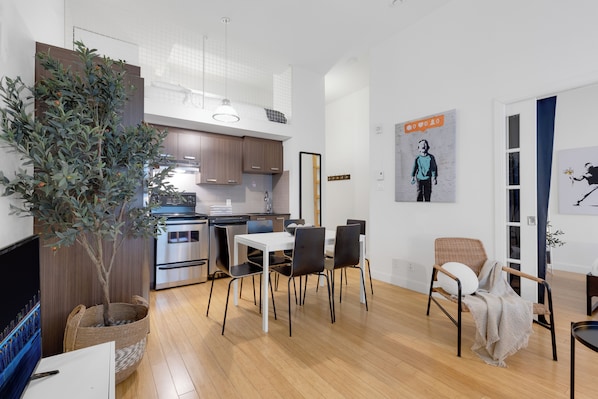 Superior Apartment, Multiple Beds, City View, Mezzanine (The Main 204) | Living area | 49-inch flat-screen TV with digital channels, Smart TV, offices