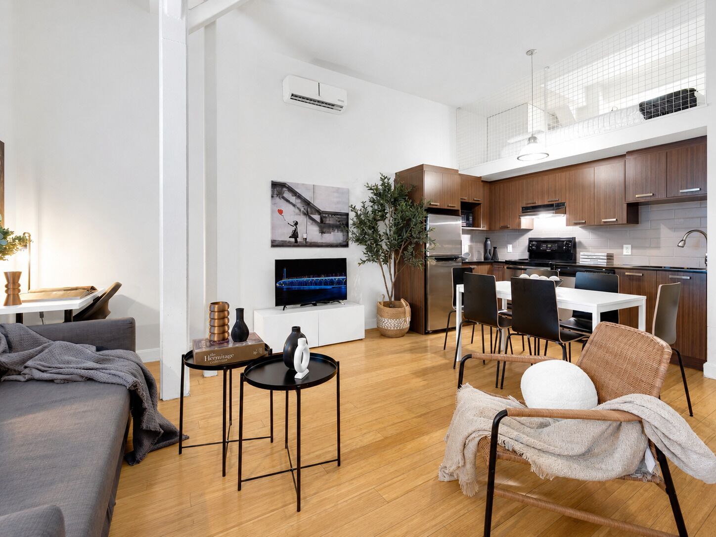 Superior Apartment, Multiple Beds, City View, Mezzanine (The Main 204) | Living area | 49-inch flat-screen TV with digital channels, Smart TV, offices