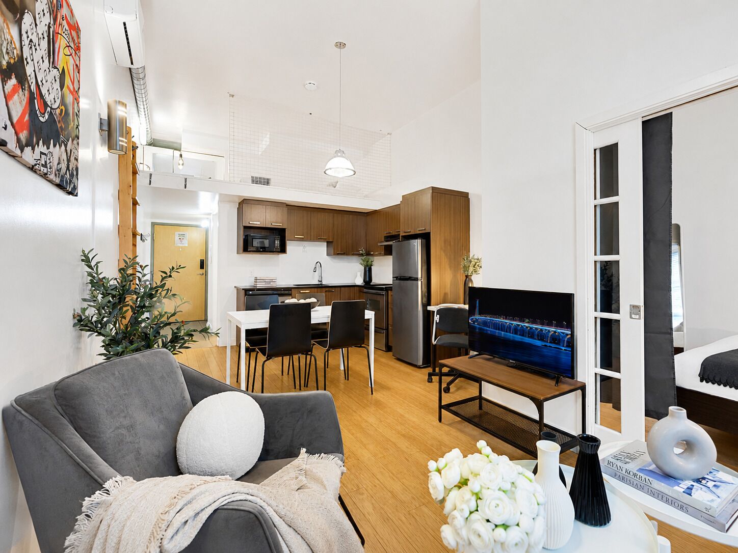 Superior Apartment, Multiple Beds, City View, Mezzanine (The Main 207) | Living area | 49-inch flat-screen TV with digital channels, Smart TV, offices