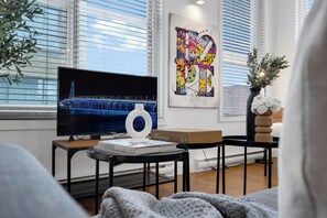 Superior Apartment, 2 Bedrooms, City View, Mezzanine (The Main 303) | Living area | 49-inch flat-screen TV with digital channels, Smart TV, offices -  Liv MTL - Main (Montreal)