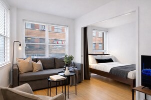 Premium Apartment, Multiple Beds, City View, Mezzanine (The Main 201) | In-room dining