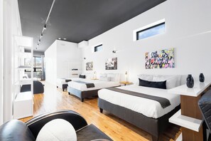 Premium Penthouse, Multiple Beds, 2 Bathrooms, City View (with Loft Plaza 200) | Living area | 65-inch Smart TV with digital channels, TV, fireplace -  Liv MTL - Plaza (Montreal)