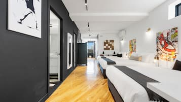 Superior Penthouse, Multiple Beds, 2 Bathrooms, City View (with Loft Plaza 300) | Living area | 65-inch Smart TV with digital channels, TV, fireplace