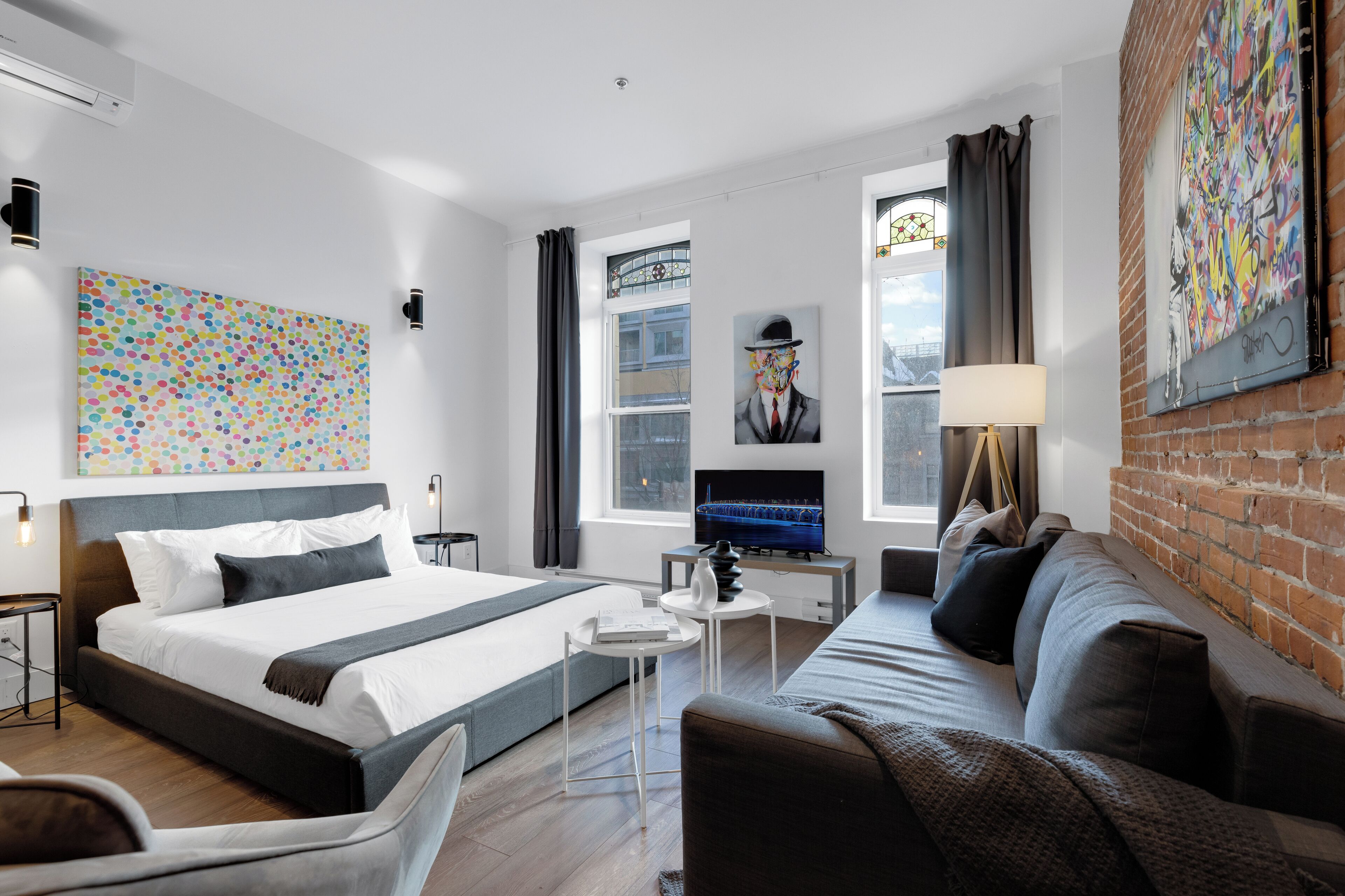 Deluxe Studio Suite, 1 Queen Bed with Sofa bed, City View (Downtown 302) | Living area | 49-inch Smart TV with digital channels, TV, offices