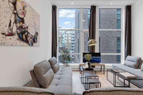 Superior Duplex, Multiple Beds, City View (Duplex Downtown 403) | Living area | 49-inch Smart TV with digital channels, TV, offices
