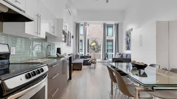 Superior Duplex, Multiple Beds, City View (Duplex Downtown 502) | Living area | 49-inch Smart TV with digital channels, TV, offices