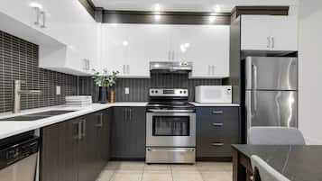 Premium Apartment, 4 Bedrooms, Pets allowed, City View (The CH3 - Suite 3) | Private kitchen | Full-sized fridge, microwave, oven, stovetop