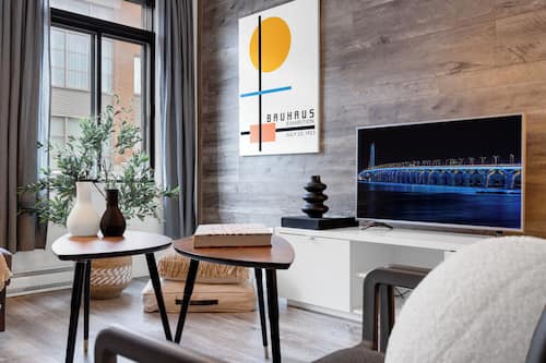 Premium Apartment, Multiple Beds, City View (Urban 1) | Living area | Smart TV, offices