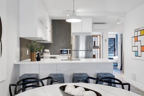 Premium Apartment, Multiple Beds, City View (Urban 1) | Private kitchen | Full-sized fridge, microwave, oven, stovetop - LiV MTL - Urban (Montreal)