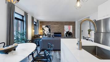 Premium Apartment, Multiple Beds, City View (Urban 4) | Living area | Smart TV, offices