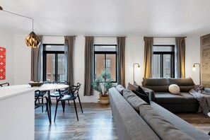 Premium Apartment, Multiple Beds, City View (Urban 4) | Living area | Smart TV, offices