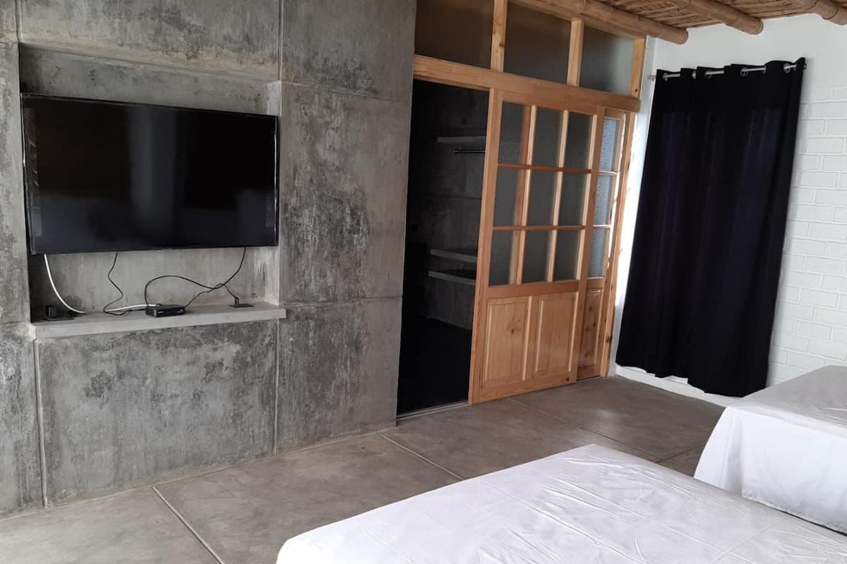 Exclusive Quadruple Room | Blackout drapes, rollaway beds (surcharge), WiFi (free), bed sheets