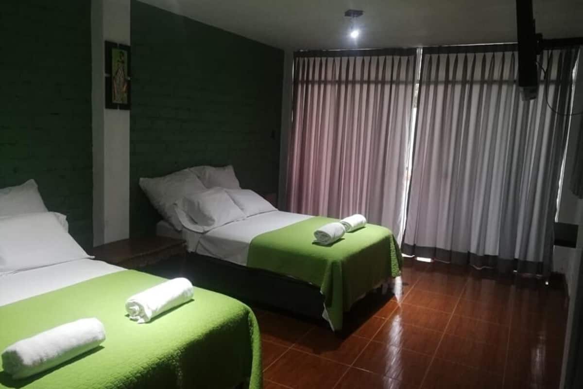 Signature Quadruple Room | Blackout drapes, rollaway beds (surcharge), WiFi (free), bed sheets
