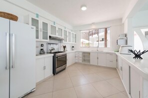 Family Apartment, 3 Bedrooms, Non Smoking, Beach View (1) | Private kitchen | Full-size fridge, microwave, oven, stovetop