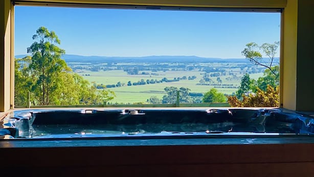A window with a view of a rural landscape, including fields and trees. - Grand Gippsland Home Sleeps Up To 28 (Trafalgar East)