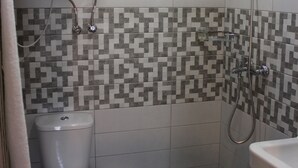 Basic Triple Room | Bathroom | Shower, free toiletries, hair dryer, slippers - Lile Hotel (Tbilisi)