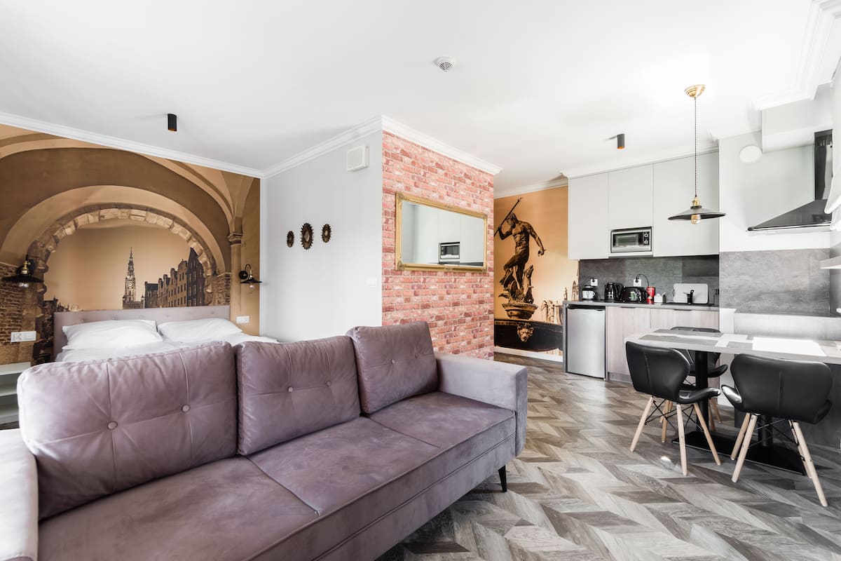 Apartamento (Suite-7) | Área de estar | TV
