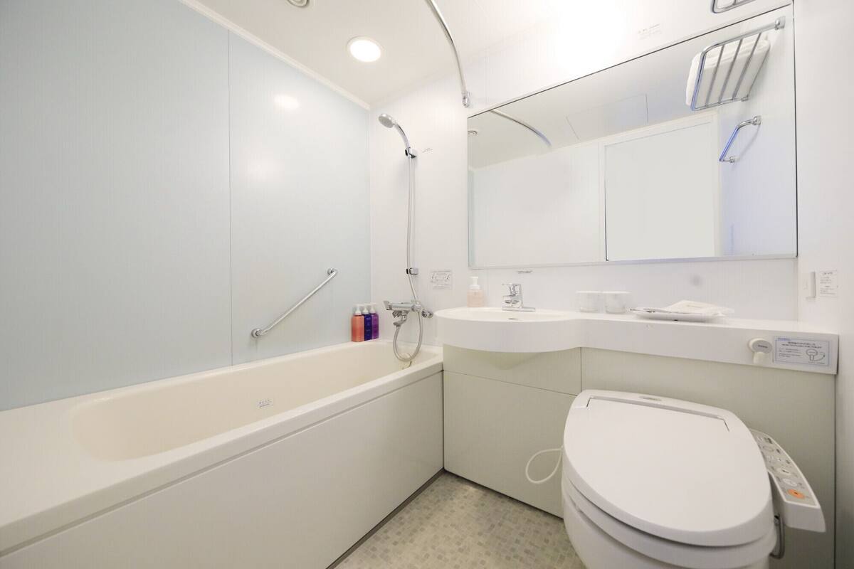 desk, laptop workspace, blackout curtains, iron/ironing board