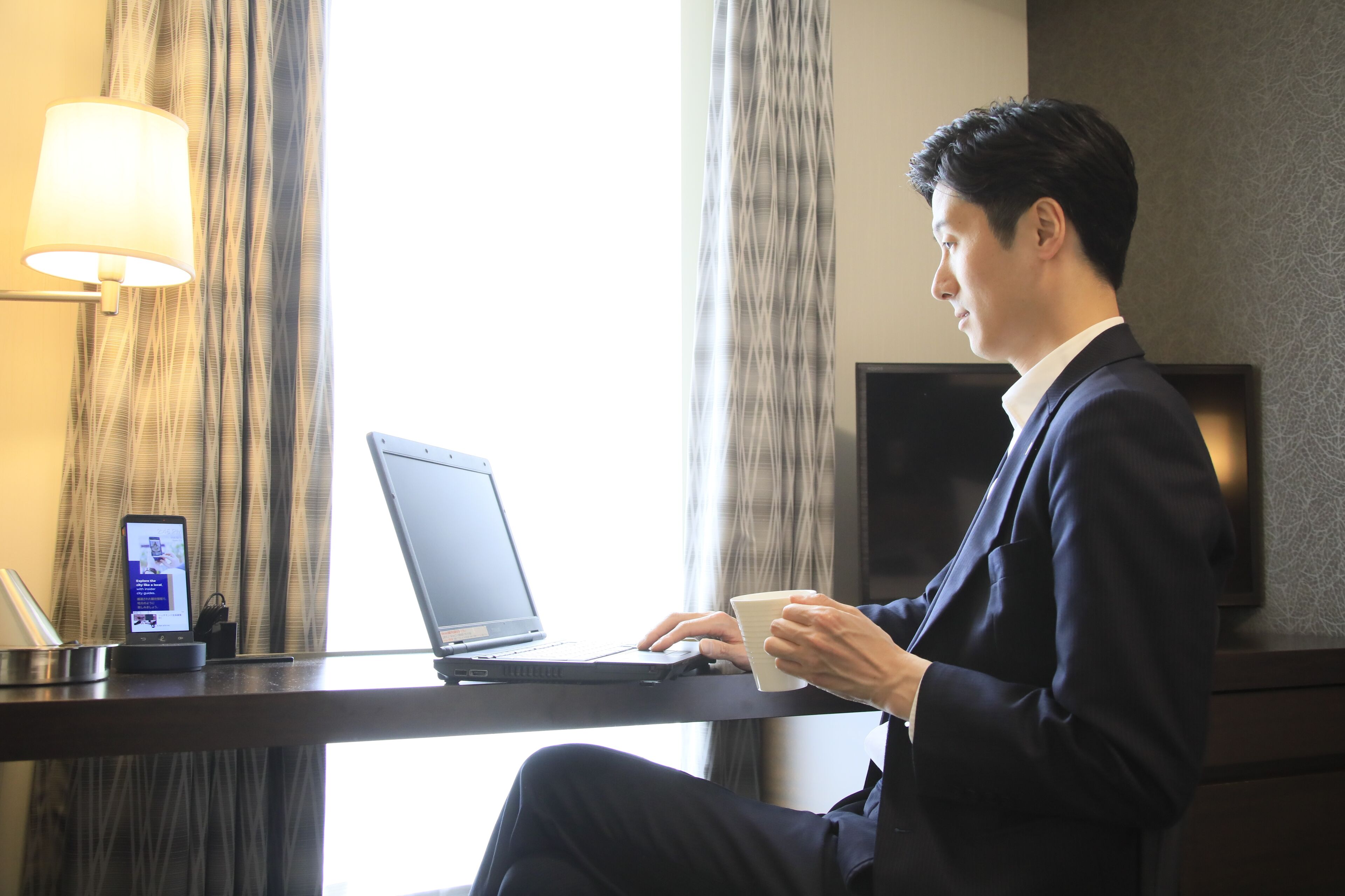 desk, laptop workspace, blackout curtains, iron/ironing board