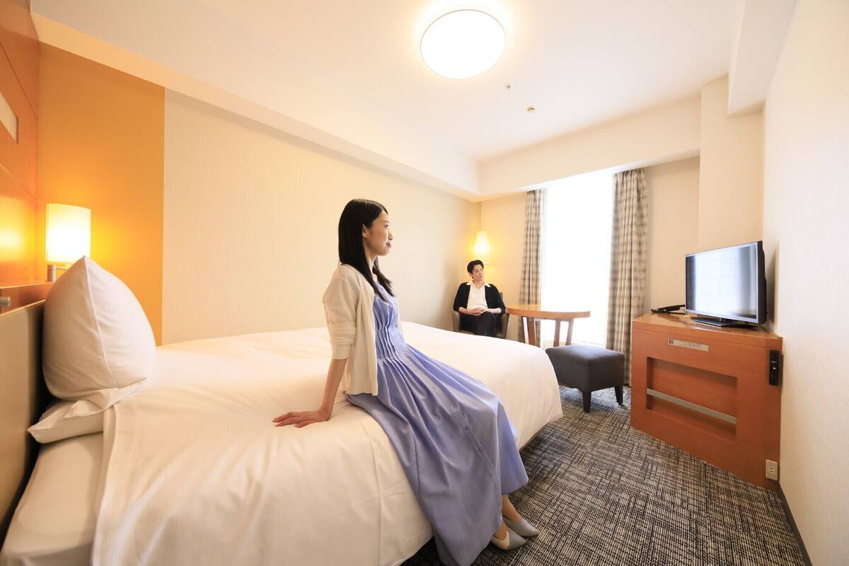 desk, laptop workspace, blackout curtains, iron/ironing board