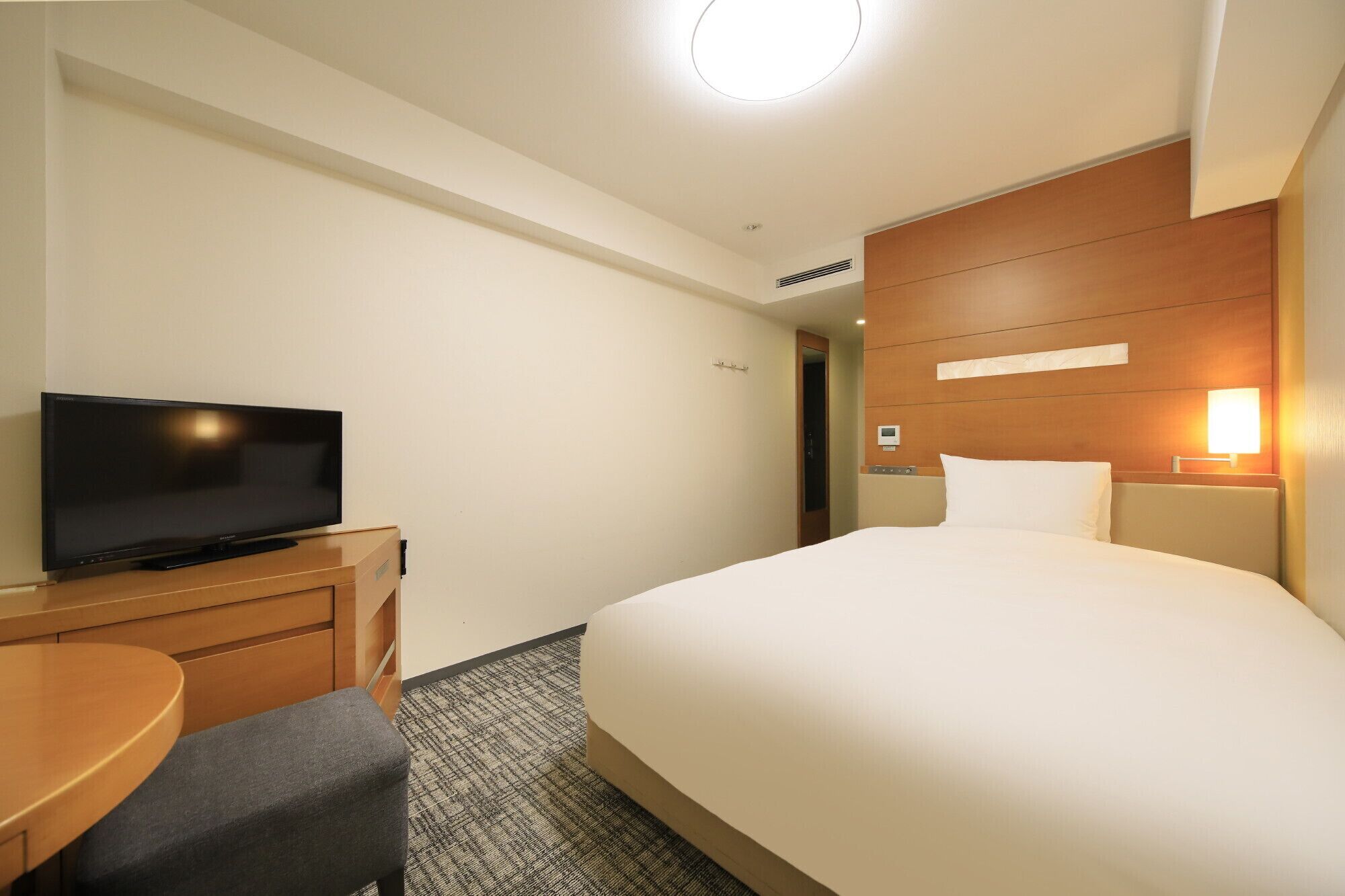 desk, laptop workspace, blackout curtains, iron/ironing board