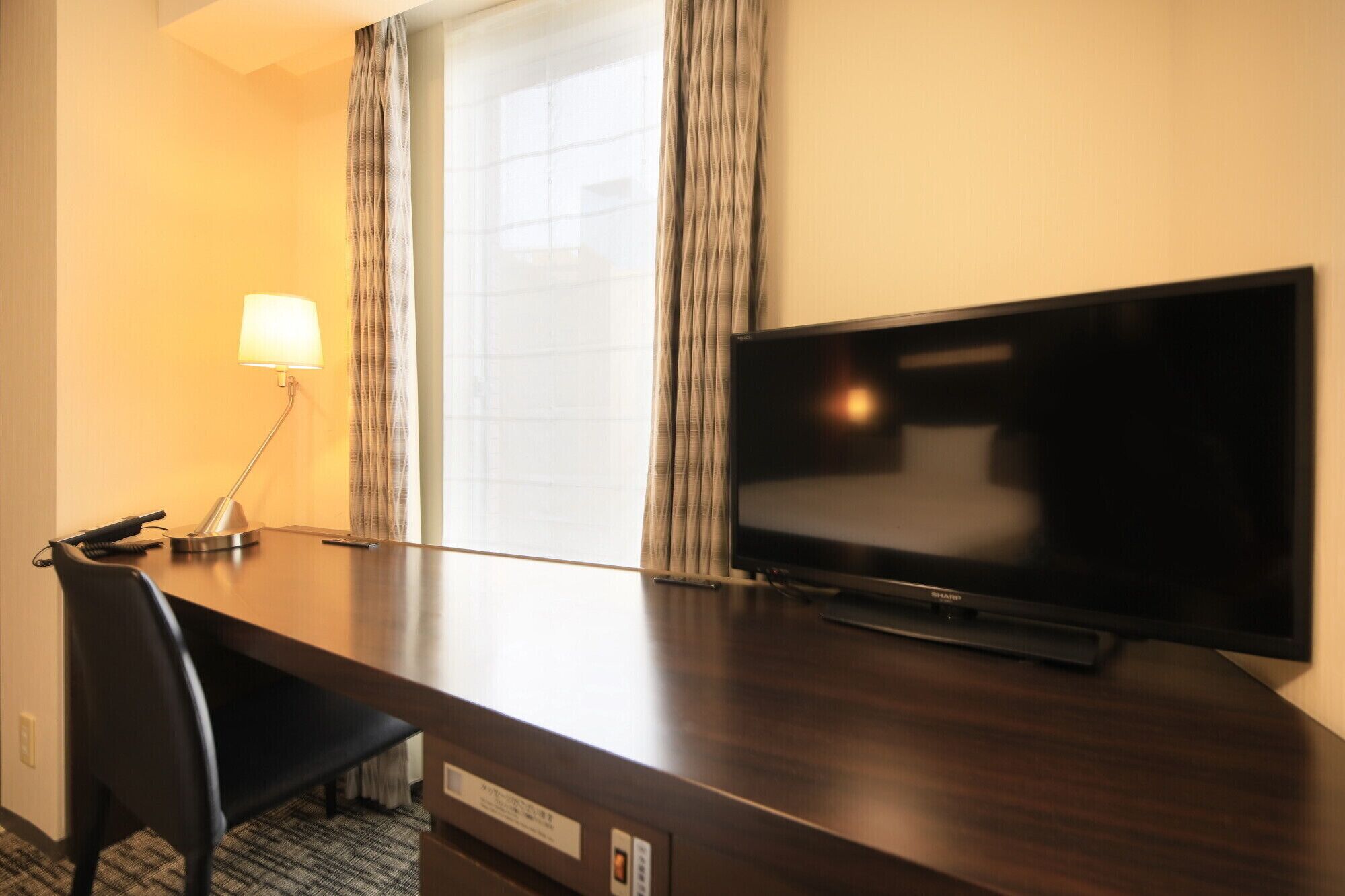 desk, laptop workspace, blackout curtains, iron/ironing board